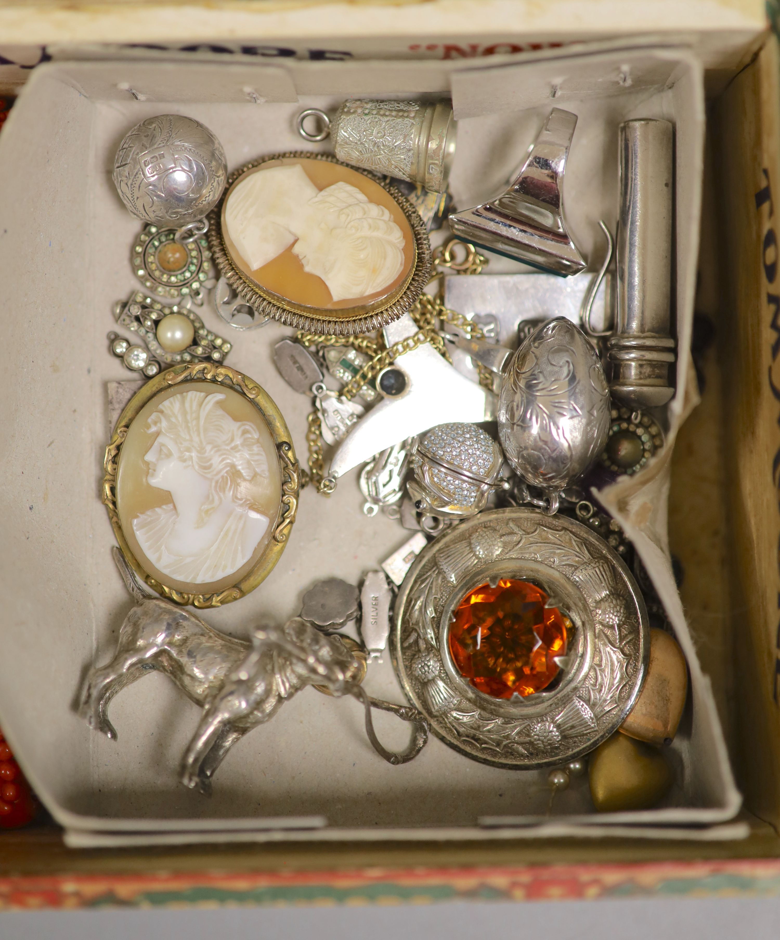 A miniature silver model of a hound and a quantity of costume jewellery.